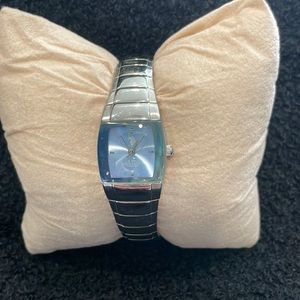 Beautiful silver with crystal light blue display.